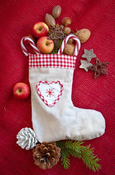 Vintage gift bag with nuts and apples — Stock Photo, Image