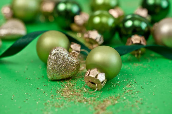 Christmas ornaments in various green tones — Stock Photo, Image