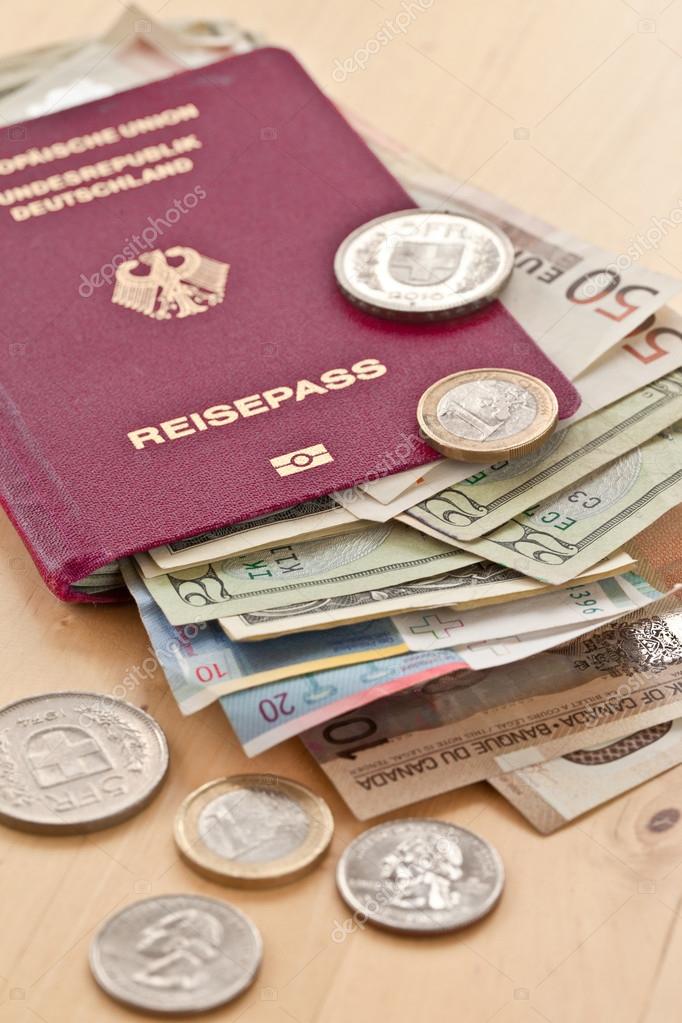 Немецкий паспорт и различные валюты стоковое фото ©BarbaraNeveu 37369035