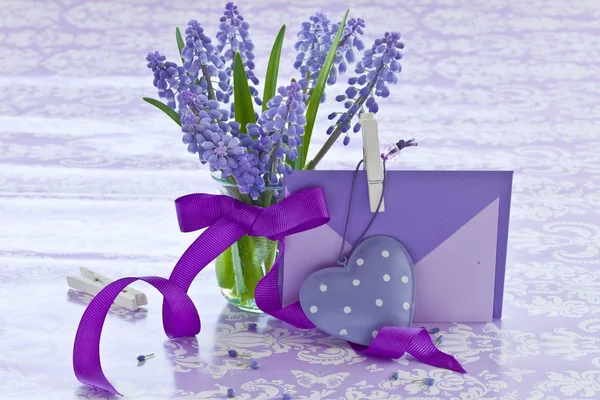 Fresh hyacinths in little vase — Stock Photo, Image