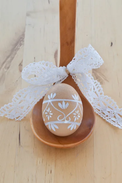 Easter egg on wooden spoon — Stock Photo, Image