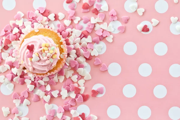 Little cupcake with pink frosting — Stock Photo, Image