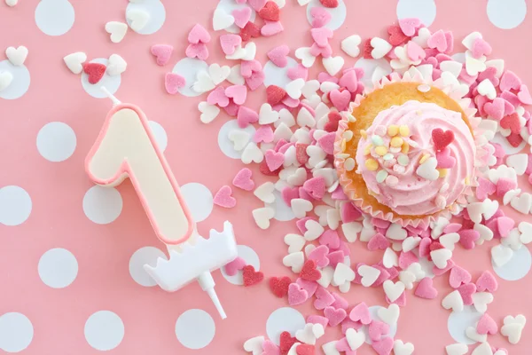 Little cupcake with pink frosting — Stock Photo, Image