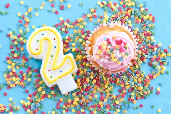 Little cupcake with pink frosting — Stock Photo, Image