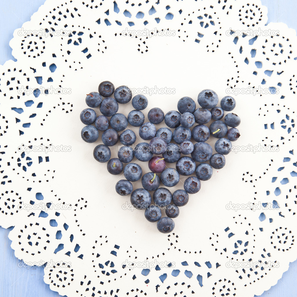 Fresh blueberries in a heart-shape