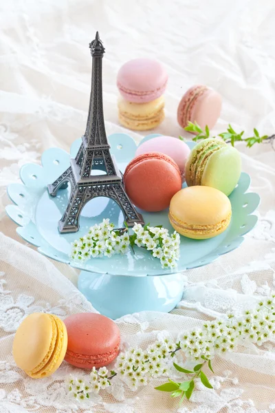 Colorful macaroons on blue plate — Stock Photo, Image