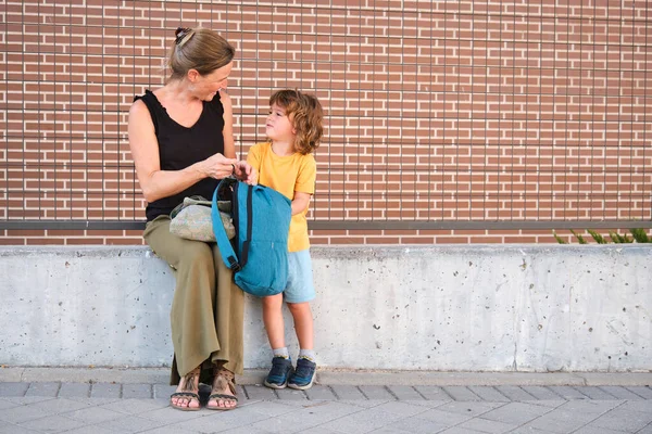 Mother Child Placing Backpack Entering School First Day School — Foto de Stock