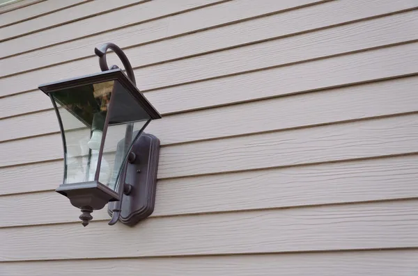 Lamp on the plank wall — Stock Photo, Image