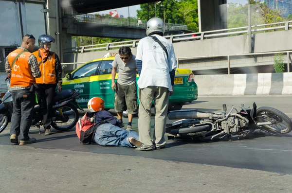 Helmet save riders from accident on the street. — Zdjęcie stockowe