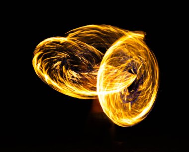 Fire show on the beach at night in Phuket, Thailand