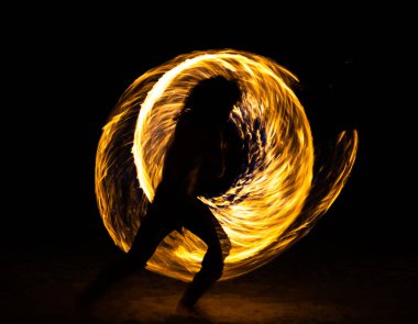 Fire show on the beach at night in Phuket, Thailand