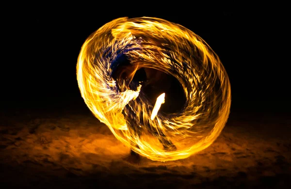 Fire show on the beach at night in Phuket, Thailand — 图库照片