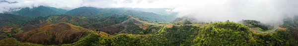 Aerial view of Curvy road number 3 in the mountain of Pua district, Nan province, Thailand — стоковое фото