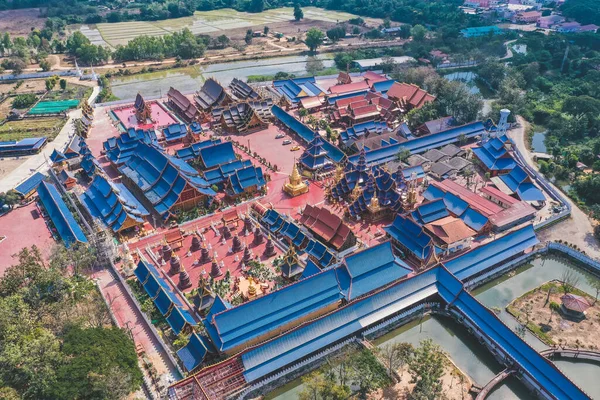 Aerial view of Wat Phiphat Mongkhon blue temple in Sukhothai, Thailand — стоковое фото