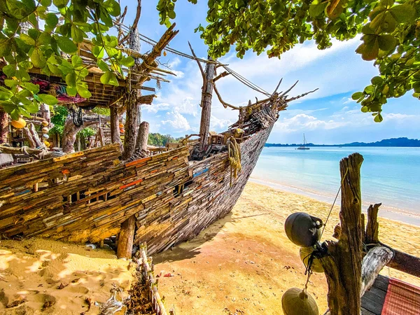 Old wooden pirate boat on the beach in Koh Phayam, Ranong, Thailand, south east asia