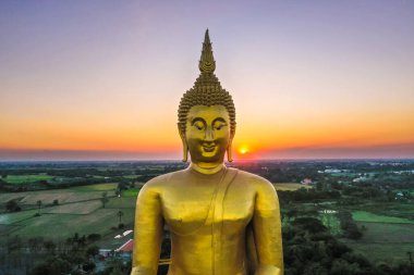 Big Buddha during sunset at Wat Muang in Ang Thong, Thailand, south east asia