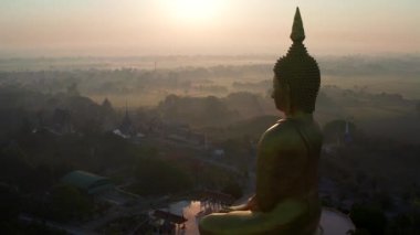 Big Buddha during sunset at Wat Muang in Ang Thong, Thailand, south east asia