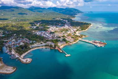 Aerial view of Thong Sala pier, boat and koh Tae Nai in koh Phangan, Thailand, south east asia