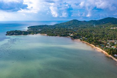 Aerial view of Hin Kong beach and its sand bank, in Koh Pha Ngan, Thailand, south east asia