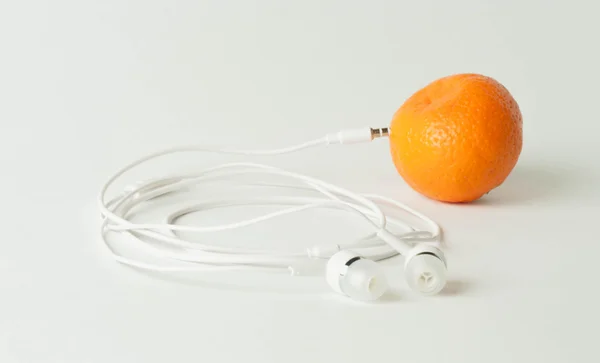 White headphones with bright orange — Stock Photo, Image