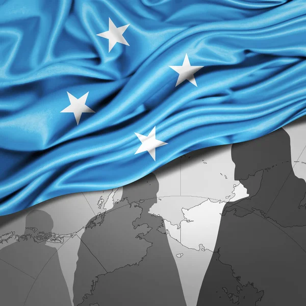 Mikronesien Flagge Aus Seide Mit Weltkarte Und Menschlichen Silhouetten Hintergrund — Stockfoto