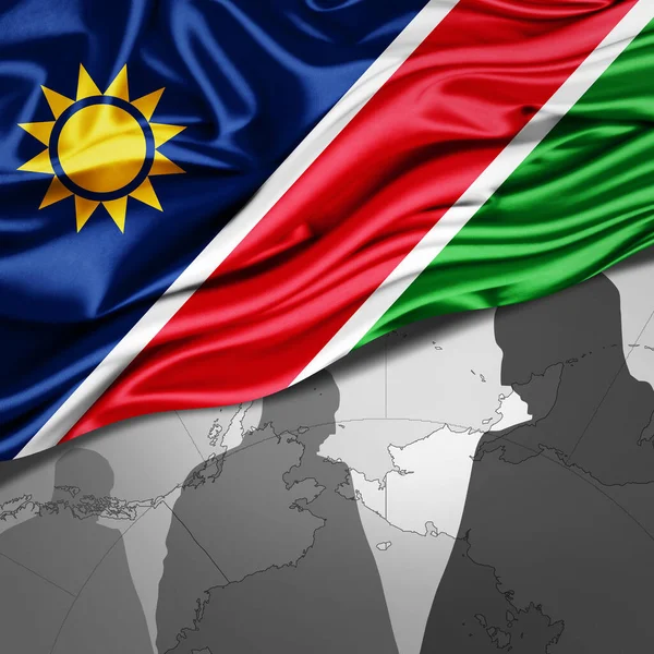 Namibië Vlag Van Zijde Met Wereldkaart Menselijke Silhouetten Achtergrond Illustratie — Stockfoto