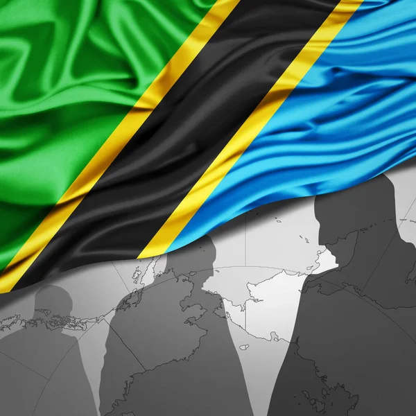 Флаг Танзании Шёлка Картой Мира Силуэтами Человека — стоковое фото