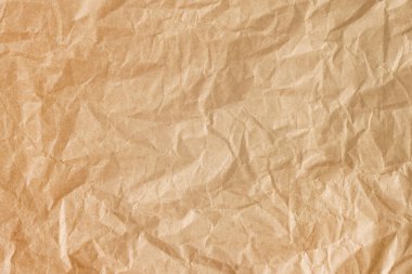 Buruşmuş altın kaplama arka plan dokusu. Kahverengi buruşuk kağıt arkaplan