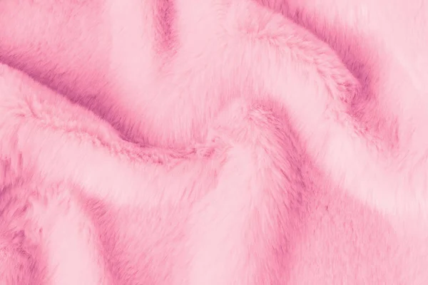 Texture of pink shaggy fur. Animal sweet soft texture