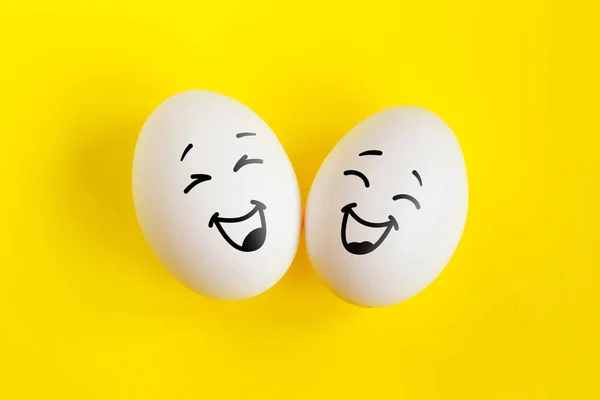 Two White Eggs Yellow Background Concept Emotions Laughter Happiness Friendship — Stock Photo, Image