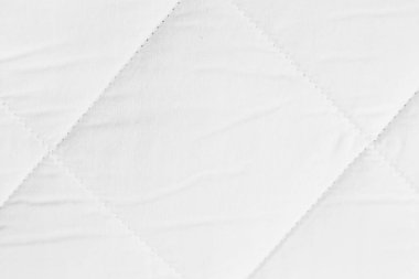 Ortopedik yatak için beyaz kumaşın örtülü dokusu