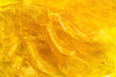 turuncu parıltılı doku. Dalgalarla soyut arkaplan