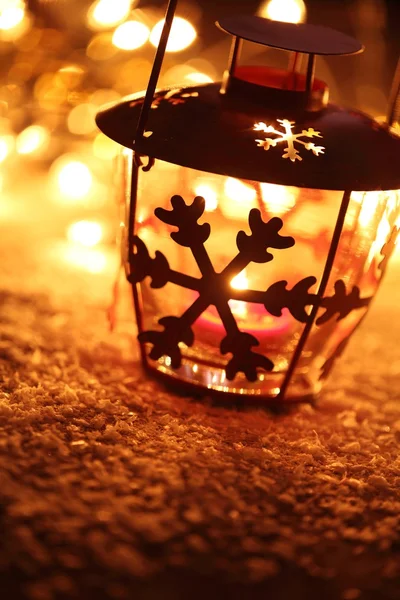 Lantern with snowflake with Christmas lights — Stock Photo, Image