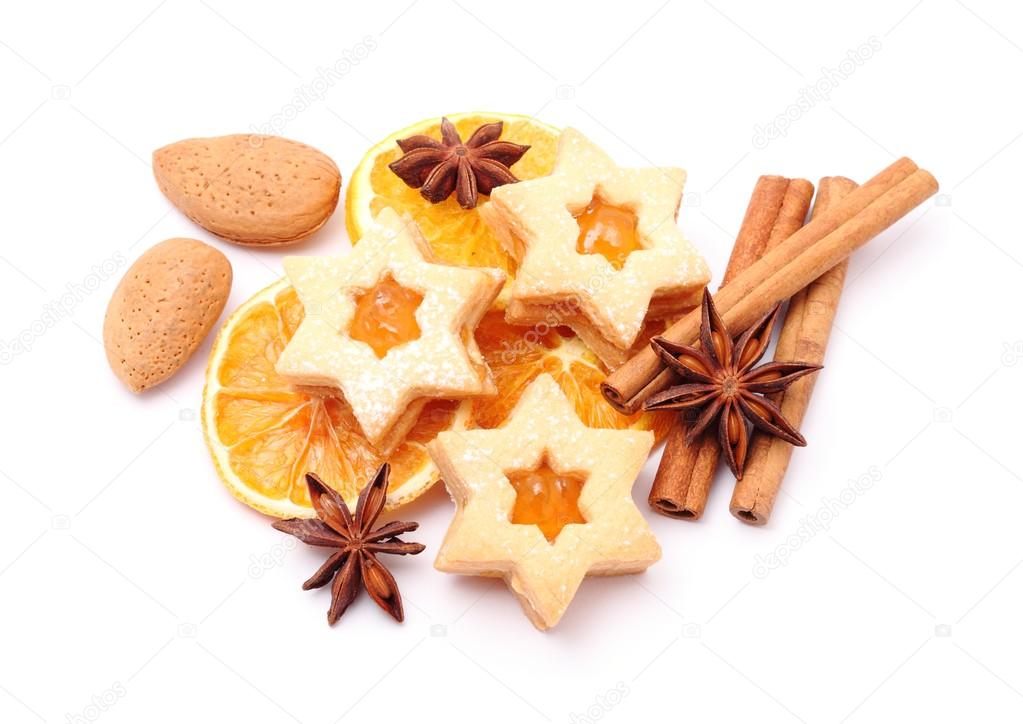 Christmas cookies, spices, alomonds and dry orange slices