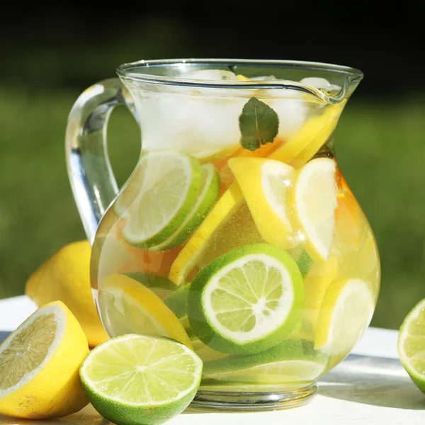 Jug with fresh lemonade — Stock Photo, Image