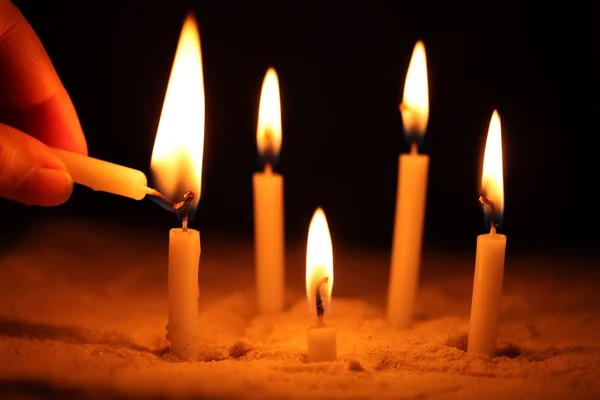 Hand with candle — Stock Photo, Image