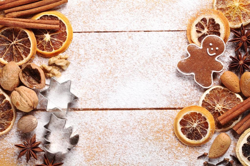 Wooden board with Christmas baking ingredients.