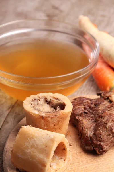 Bowl with beef broth, — Stock Photo, Image