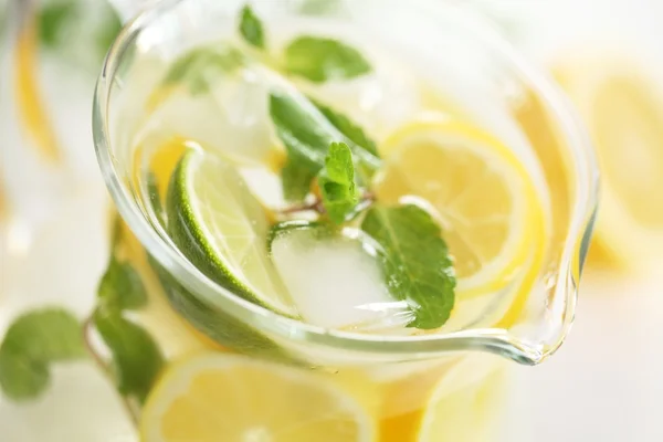 Glass jug with fresh lemonade. — Stock Photo, Image