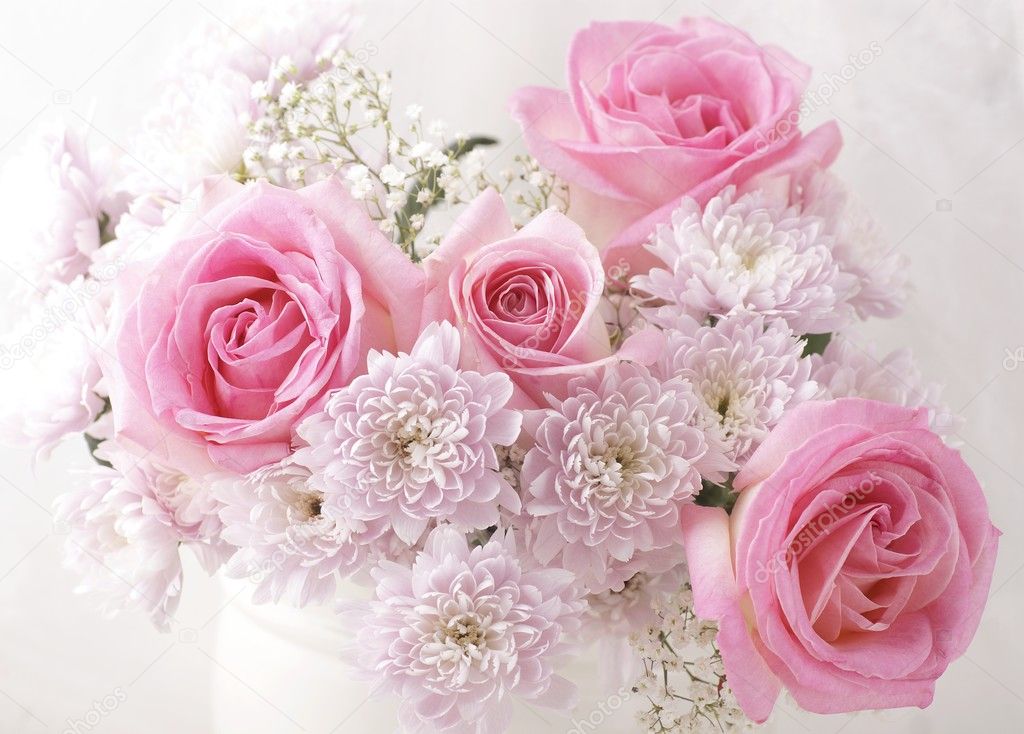 Pink and white flowers in a vase.