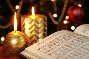 Songbook with Christmas carols clipart