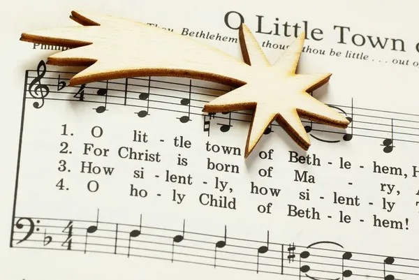 Songbook with Christmas carols and christmas decoration. — Stock Photo, Image