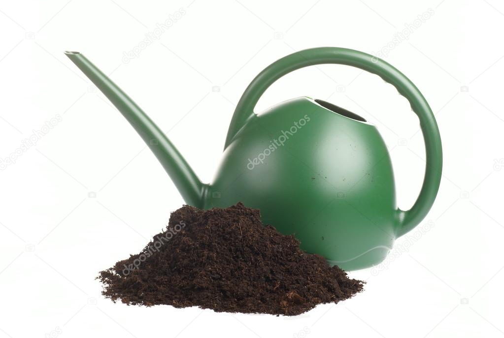 Soil and watering can