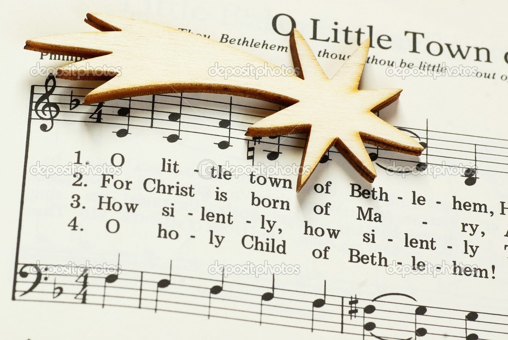 Songbook with Christmas carols and christmas decoration.