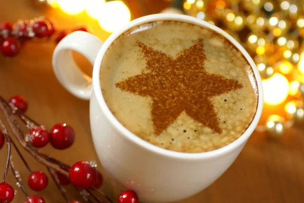 Cup of coffee and cinnamone star. — Stock Photo, Image