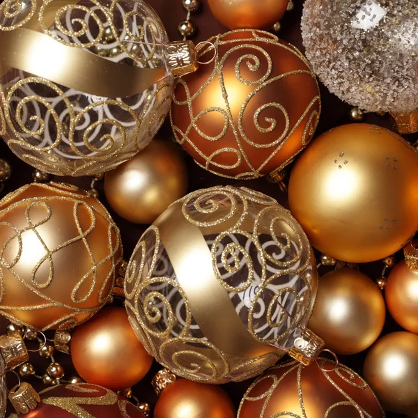 Goldene Weihnachtsschmuck Hintergrund. — Stockfoto