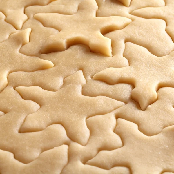 Gebäck für Weihnachtsplätzchen und Schneeflockenformen. — Stockfoto