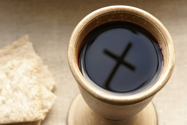 Chalice with wine and bread. — Stock Photo, Image