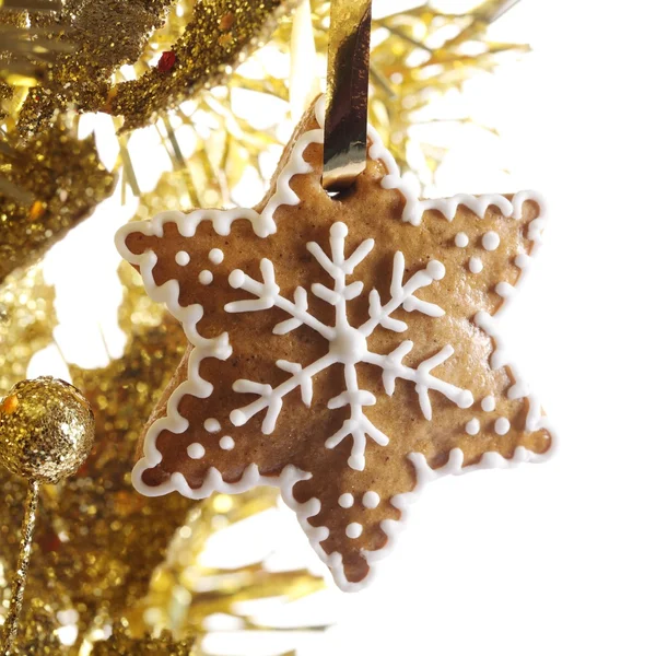 Close-up of gingerbread star on white background — Stock Photo, Image