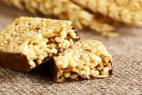 Detail of granola bars, chocolate and cereal — Stock Photo, Image